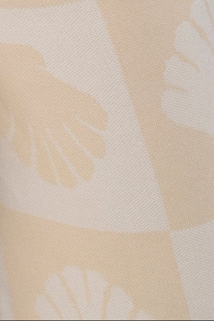 Closeup of checkered shell patterned cotton knit fabrics