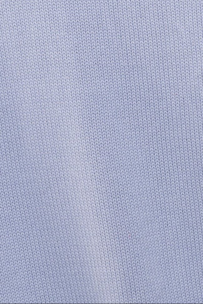 Closeup of blue sustainable knit cotton cardigan